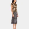 Den gullfargede Sparkle Disc-toppen