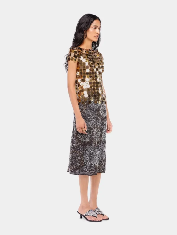 Den gullfargede Sparkle Disc-toppen