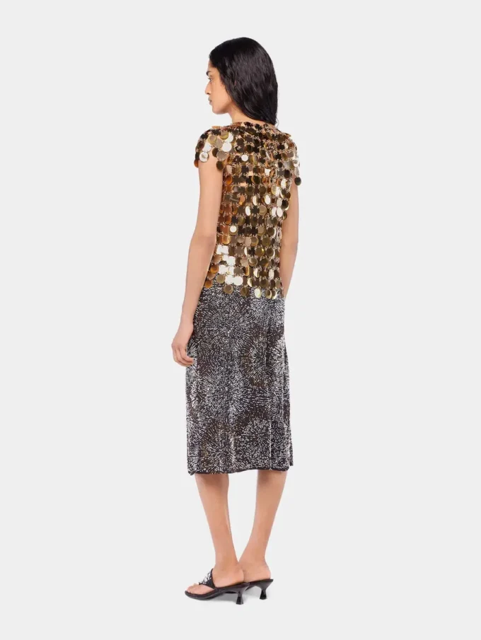 Den gullfargede Sparkle Disc-toppen