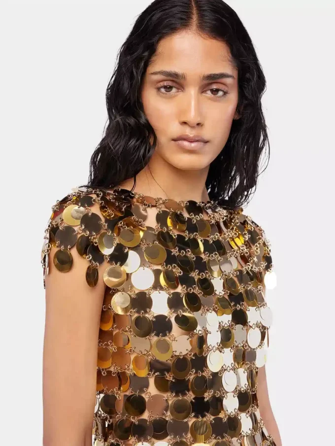 Den gullfargede Sparkle Disc-toppen