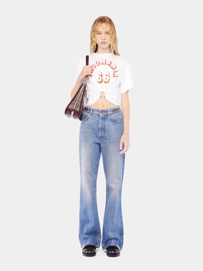 Flared jeans pyntet med 1969-skiver