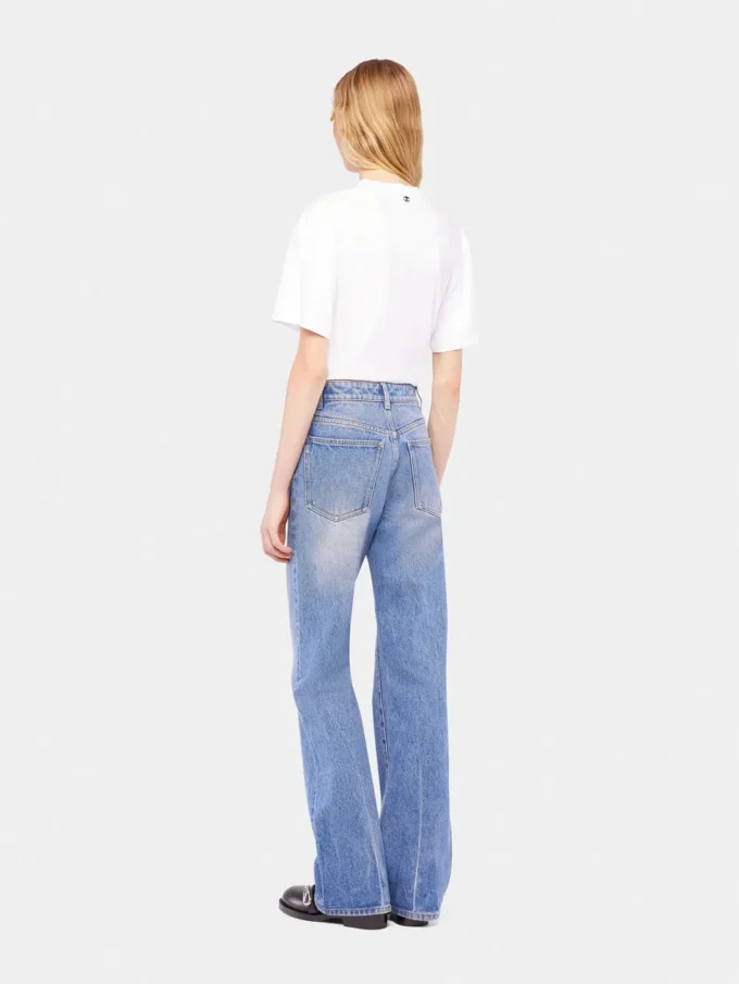 Flared jeans pyntet med 1969-skiver