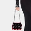 Glitrende veske
