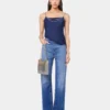 Signaturjeans med 1969-metallskiver