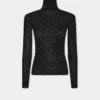 Turtleneck-top i ull som sitter som et ekstra hudlag