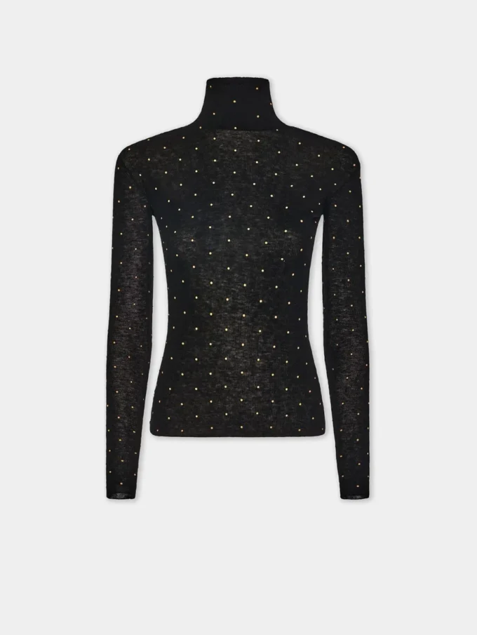 Turtleneck-top i ull som sitter som et ekstra hudlag