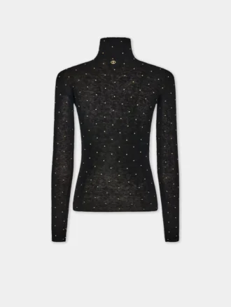Turtleneck-top i ull som sitter som et ekstra hudlag