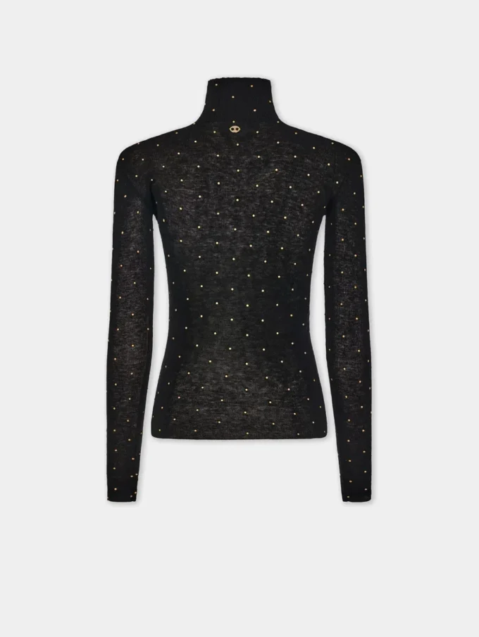 Turtleneck-top i ull som sitter som et ekstra hudlag