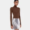 Turtleneck-top i ull som sitter som et ekstra hudlag
