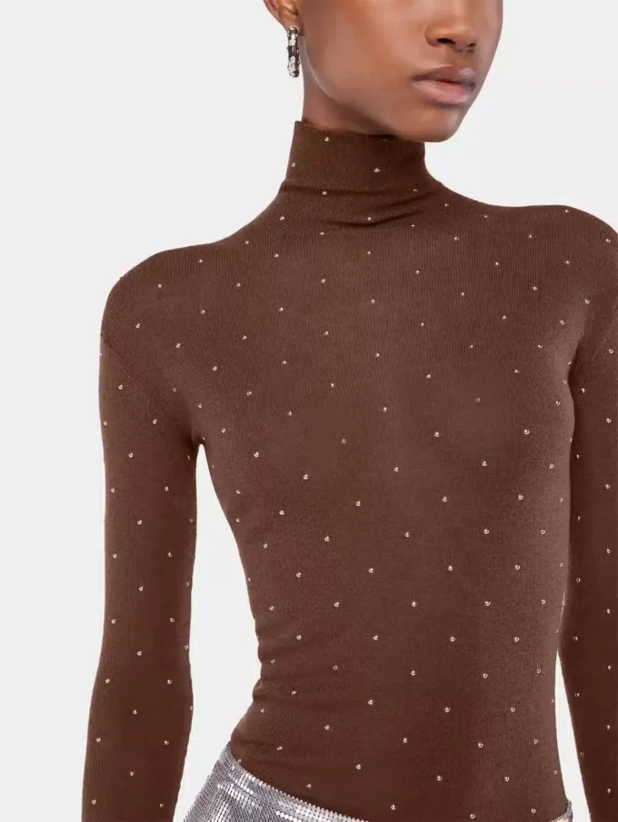 Turtleneck-top i ull som sitter som et ekstra hudlag