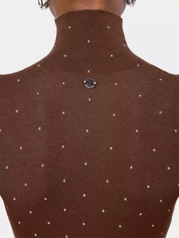 Turtleneck-top i ull som sitter som et ekstra hudlag