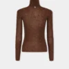 Turtleneck-top i ull som sitter som et ekstra hudlag