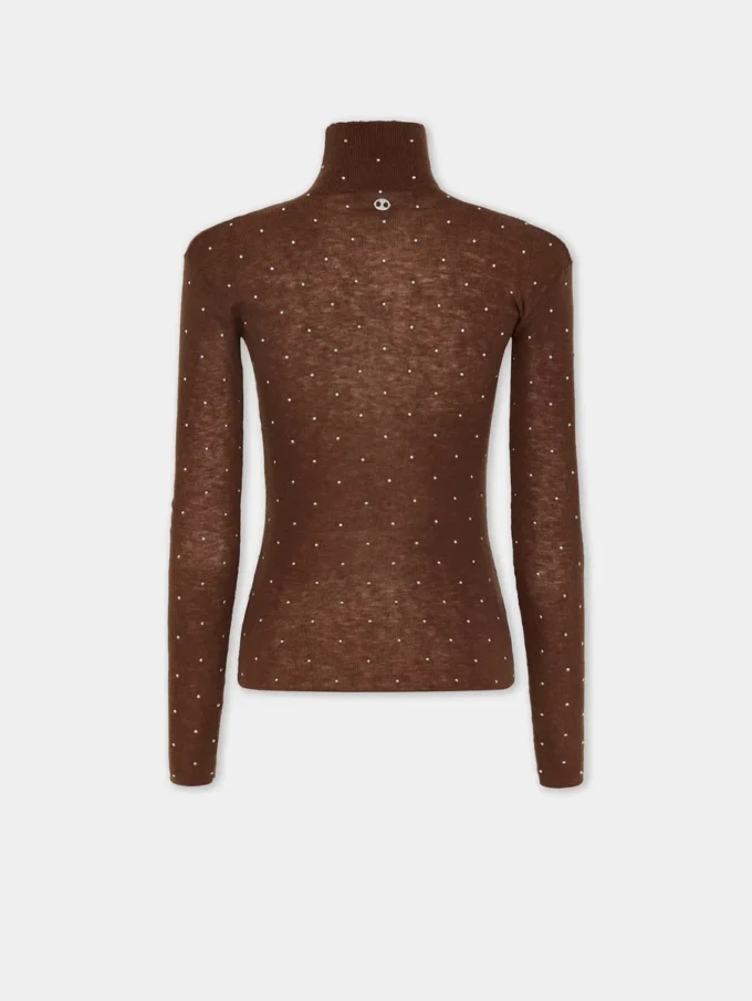 Turtleneck-top i ull som sitter som et ekstra hudlag
